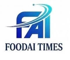「FOODAI TIMES」というメディアまたは企業のロゴです。青い「FAI」の文字と、その上を流れるような抽象的な青い曲線が特徴的なデザインです。