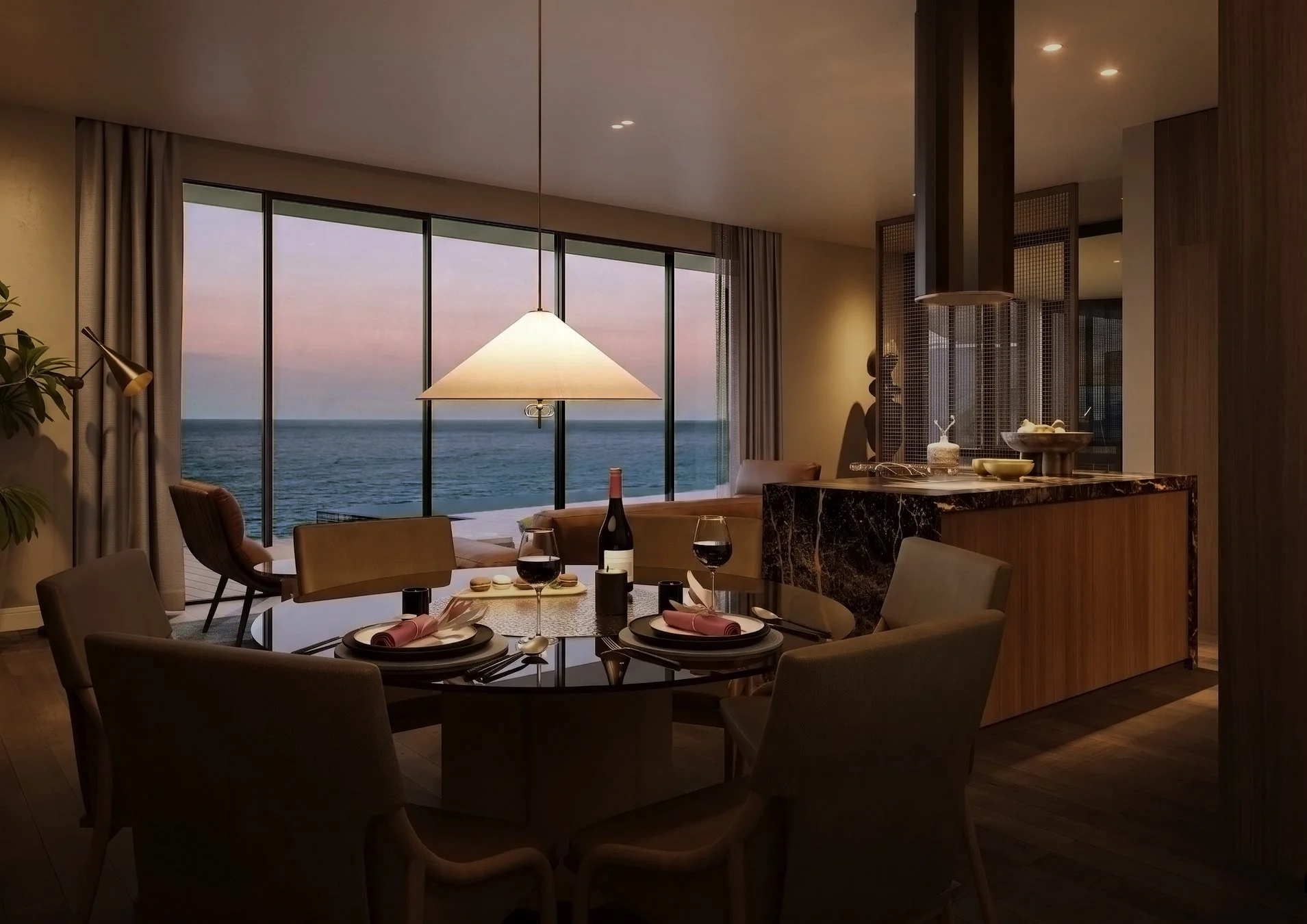 夕暮れ時の海を一望できる窓辺に位置する、モダンで豪華なダイニングとキッチンの空間