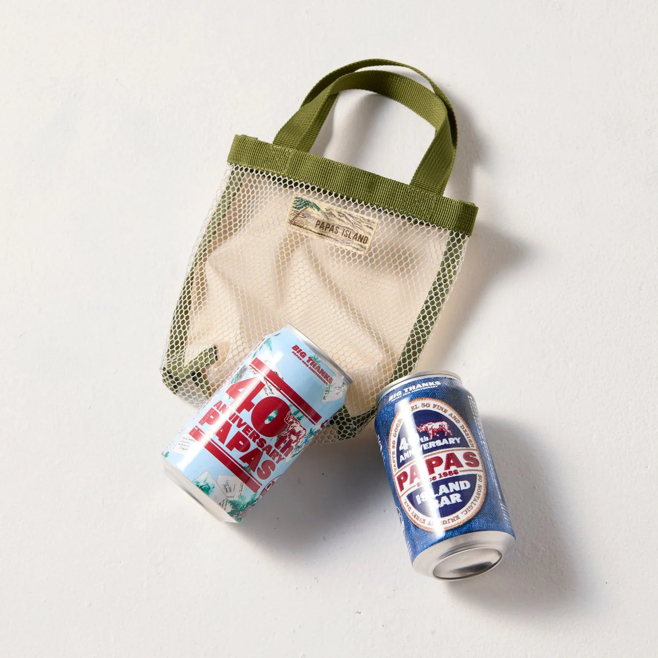 Papas 40周年記念グッズのメッシュバッグと飲料缶