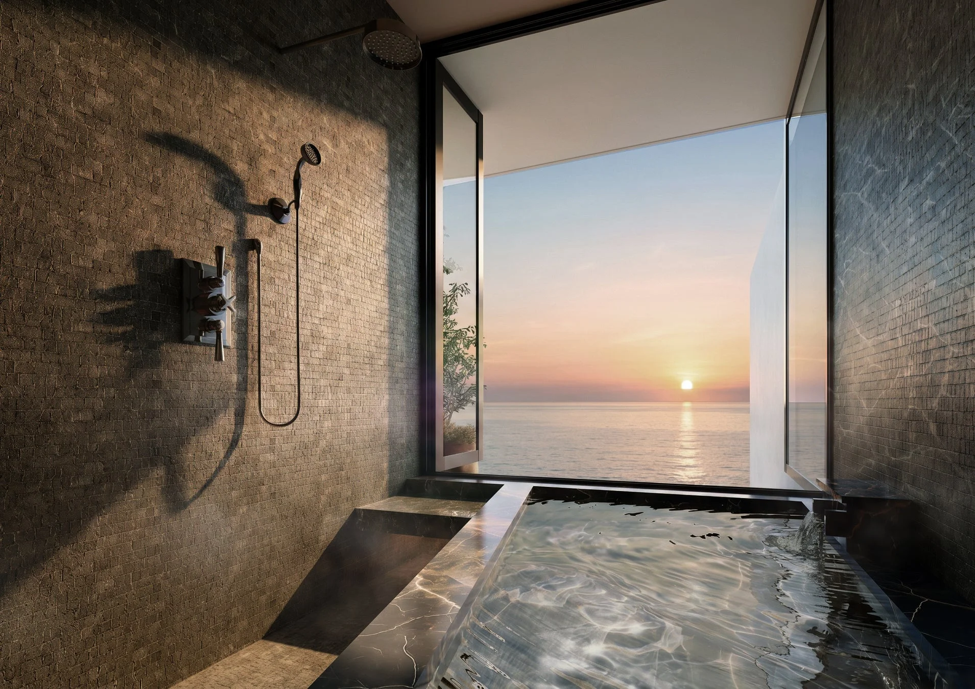 夕日が水平線に沈む絶景を望む、海に面した豪華なバスルーム